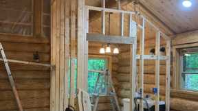 Log Cabin Build, Part 27. Framing interior walls, allowance for settling. Bathroom construction