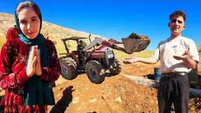 Fatima in the mountains trying to build a house with Arash's help